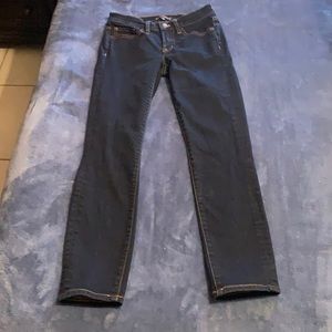 Size 24 dark wash skinny jeans in excellent condition